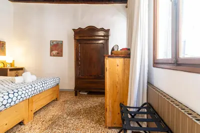 Letto o letti in una camera di Casa Trecento