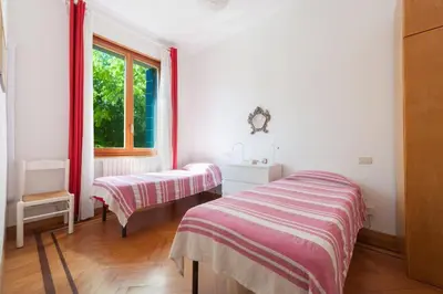 Letto o letti in una camera di Ca' Bragadin, beach and relax in Venice