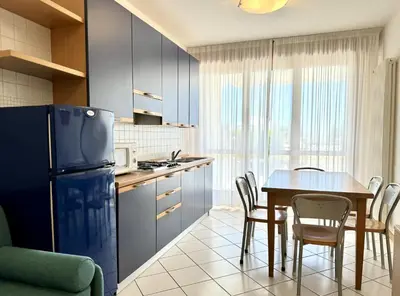 Cucina o angolo cottura di Villa Emy Fronte Mare - Carraro Immobiliare - Family Apartments