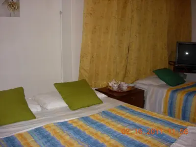 Letto o letti in una camera di Big Brother Bed & Rooms