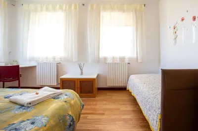 Letto o letti in una camera di Fiori di campo holiday home