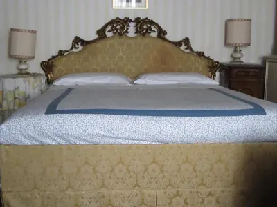 Letto o letti in una camera di At Home a Palazzo