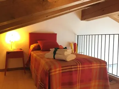 Letto o letti in una camera di Casa Rebellato
