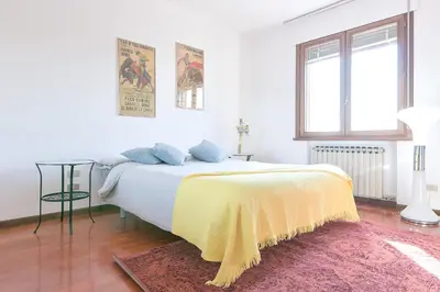 Letto o letti in una camera di Queen Home Paola