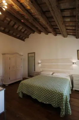 Letto o letti in una camera di Camere Abate Toaldo