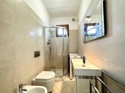 Bagno di DB Residence con Piscina - Carraro Immobiliare - Family Apartments