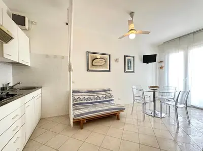 Cucina o angolo cottura di DB Residence con Piscina - Carraro Immobiliare - Family Apartments