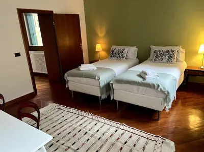 Letto o letti in una camera di Il Portico. Charm apartment, Vicenza downtown.