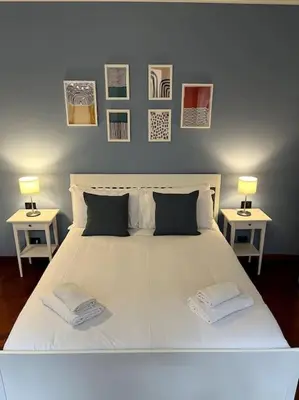 Letto o letti in una camera di Il Portico. Charm apartment, Vicenza downtown.