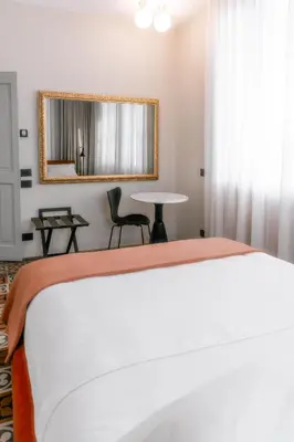 Letto o letti in una camera di LA CASA DI LAURA