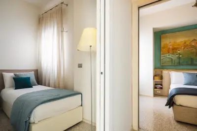 Letto o letti in una camera di Grand Canal Luxury Apartments With Terrace R&R