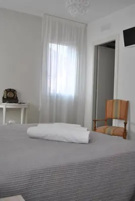 Letto o letti in una camera di Ca Ballarin B&B