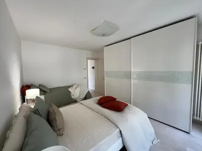 Letto o letti in una camera di Ca' Del Vecio, in centro storico, Piazza Garibaldi