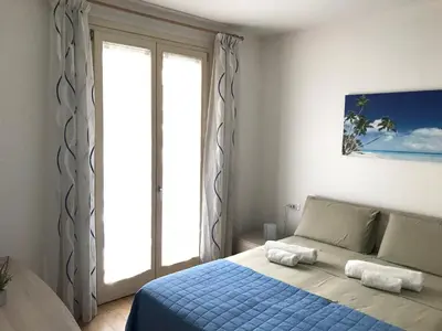 Letto o letti in una camera di Casa Giorgia