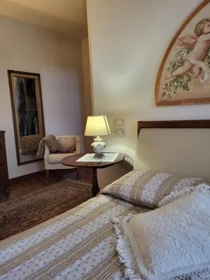 Letto o letti in una camera di Elis' House