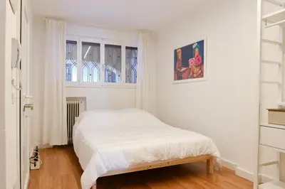 Letto o letti in una camera di [300metri dal DUOMO] Bilocale con Corte Privata