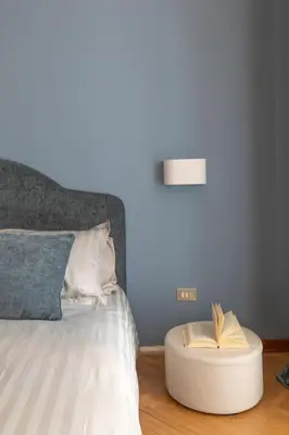 Letto o letti in una camera di Maison SantaChiara by Welc(H)ome