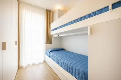 Letto o letti in una camera di Wave Plus Zan