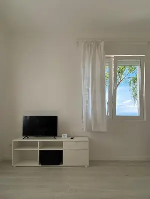 TV o dispositivi per l'intrattenimento presso Casa del Salice Lagoon View with Garden