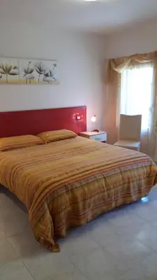 Letto o letti in una camera di Salvia e Timo Holiday Apartments