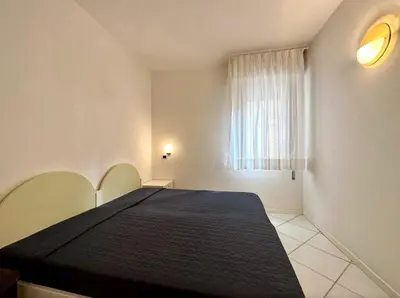 Letto o letti in una camera di Residence Vera 101 - Carraro Immobiliare - Family Apartments