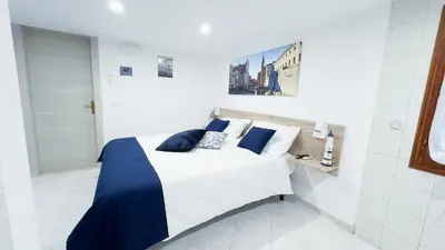 Letto o letti in una camera di Blue Eyes by Ca-Sa Check
