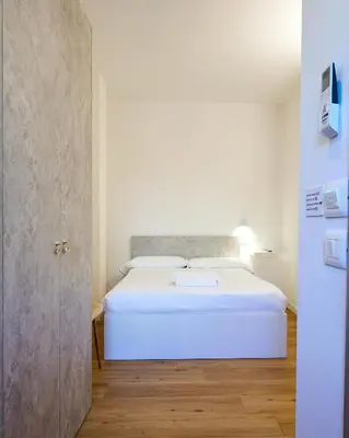 Letto o letti in una camera di Business e Tourism Superior Rooms con bagno privato MASCHERETTA Venezia Dolo