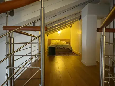 Letto o letti in una camera di Mansarda Munari in centro a Cornuda, tra le colline Prosecco
