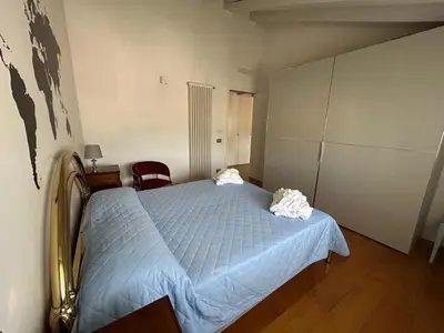 Letto o letti in una camera di Mansarda Munari in centro a Cornuda, tra le colline Prosecco