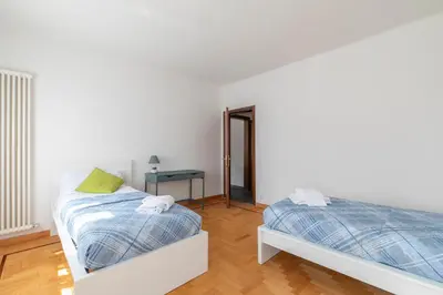 Letto o letti in una camera di Minuetto Apartment - 2 bedrooms