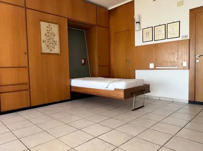 Letto o letti in una camera di Monolocale lido di Venezia