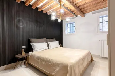Letto o letti in una camera di Venice Charming Suite Ca' Rosa