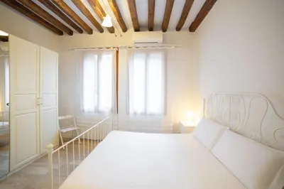 Letto o letti in una camera di Ca Lion by Venicevillas, vicino Biennale