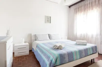 Letto o letti in una camera di Home Near Venice
