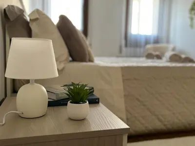 Letto o letti in una camera di ST. ALVISE SUITE