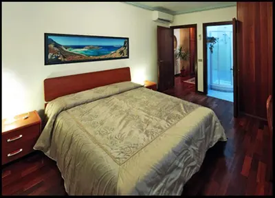 Letto o letti in una camera di B&B Oasi di Venezia
