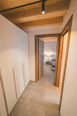 Letto o letti in una camera di BATTISTI HOSPITALITY - si, viaggiare
