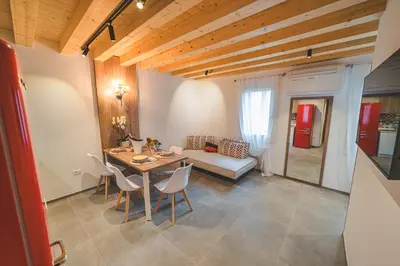 Letto o letti in una camera di BATTISTI HOSPITALITY - si, viaggiare