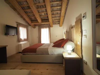 Letto o letti in una camera di AZIENDA AGRICOLA CA' LUNGA