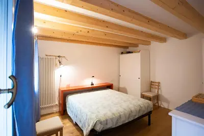 Letto o letti in una camera di Dimora Brasiola - Isola di Pellestrina Ve