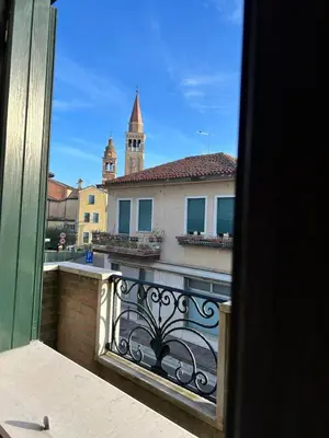 Balcone o terrazza di Villa bifamiliare per famiglie con giardino.