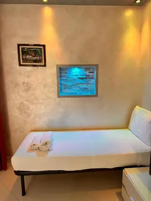 Letto o letti in una camera di Casa Gena