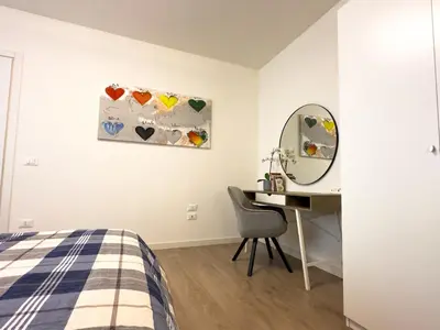 Letto o letti in una camera di [Venezia-Mestre] Design Apartment Bros#1