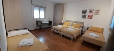 Letto o letti in una camera di Villa Andrea