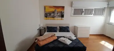 Letto o letti in una camera di Villa Andrea