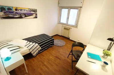 Letto o letti in una camera di Villa Andrea