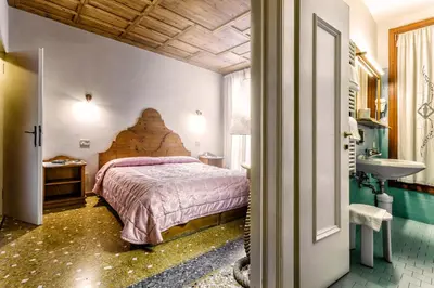 Letto o letti in una camera di Alloggi B&b Allegri