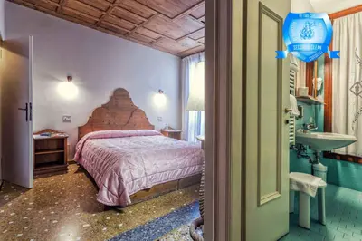 Letto o letti in una camera di Alloggi B&b Allegri