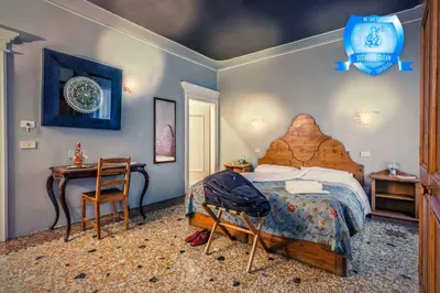 Letto o letti in una camera di Alloggi B&b Allegri