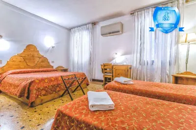 Letto o letti in una camera di Alloggi B&b Allegri